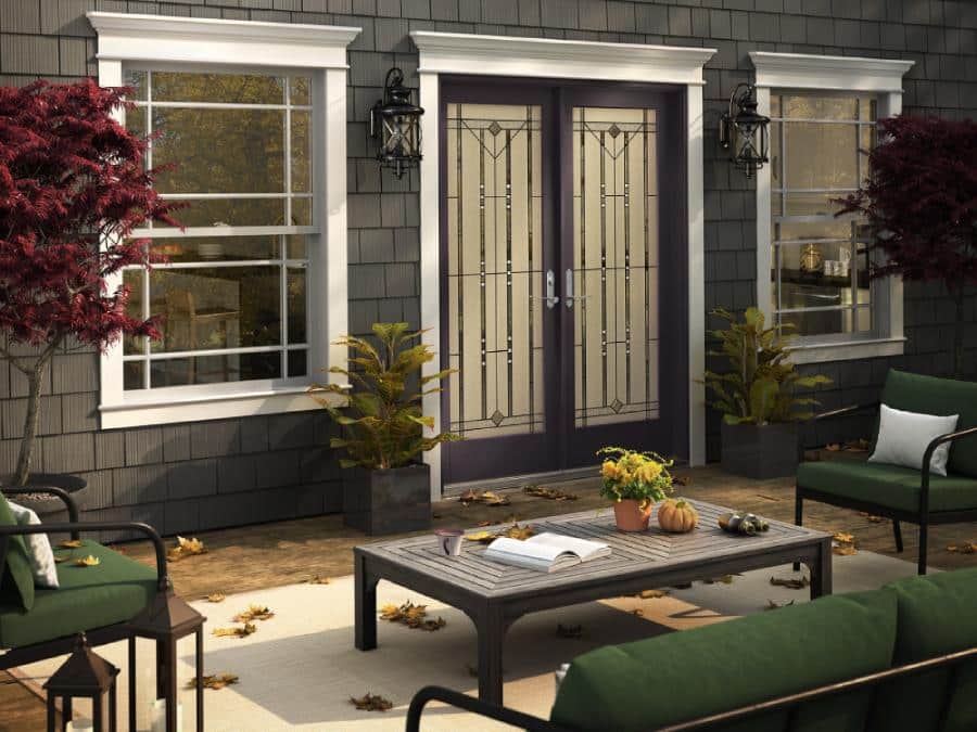French doors open to patio with Fall decor